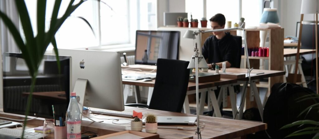 pexels-photo-380769-380769 Open-plan office with modern decor and natural lighting, ideal for productivity.